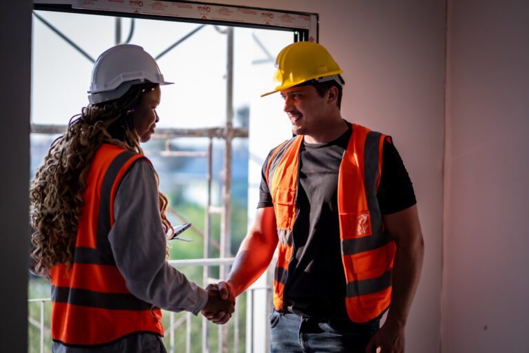 Engineer technician inspects building structure Engineer technicians are looking at and analyzing unfinished construction projects. In order to be in accordance with the design